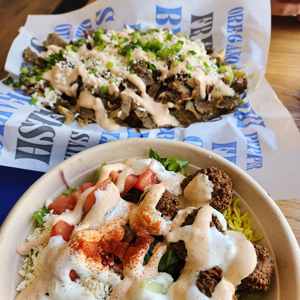 Falafel bowl and loaded Greek fries with lamb and beef