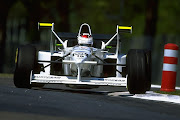 Jos Verstappen of Holland cuts close to a corner in his Tyrrell-Ford during the San Marino Grand Prix in Imola. Tyrrell's 