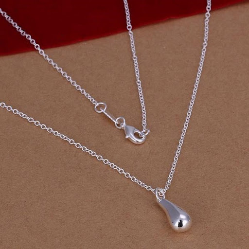 Title 3, 4-Piece Jewelry Set featuring a bracelet, neckl...
