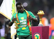 Senegal's star Sadio Mane celebrates after winning the Africa Cup of Nations with the Lions of Teranga at Olembe Stadium.