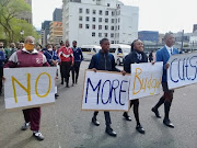 Members of Equal Education picket outside parliament on Wednesday ahead of finance minister Tito Mboweni’s mini-budget speech.