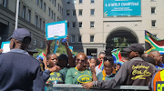 A fan carries a sign reading 'Etzbeth, please marry me' in the Johannesburg CBD on Thursday.