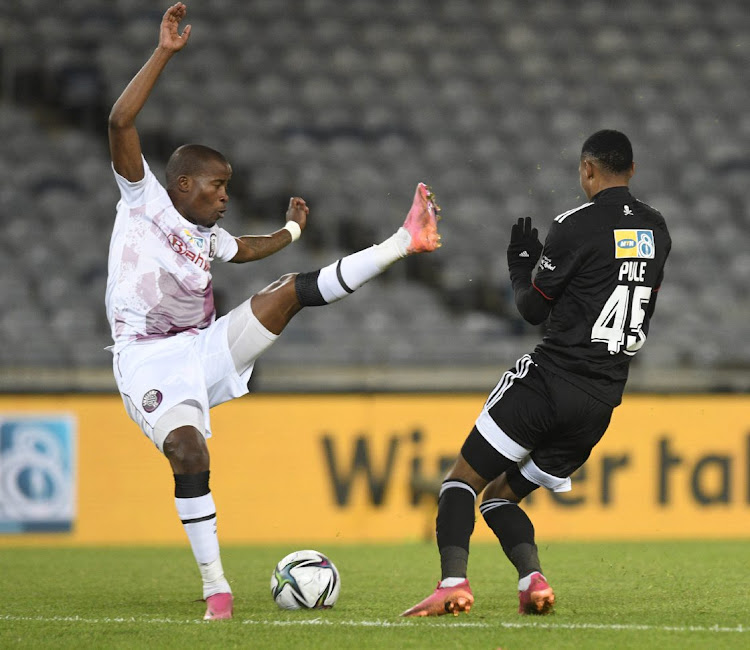 Thabo Matlaba of Swallows FC challenges Vincent Pule of Orlando Pirates during the MTN8 match at Orlando Stadium on August 14 2021.