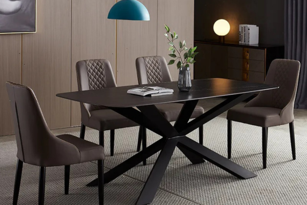 Black sintered stone dining table with sleek metal leg