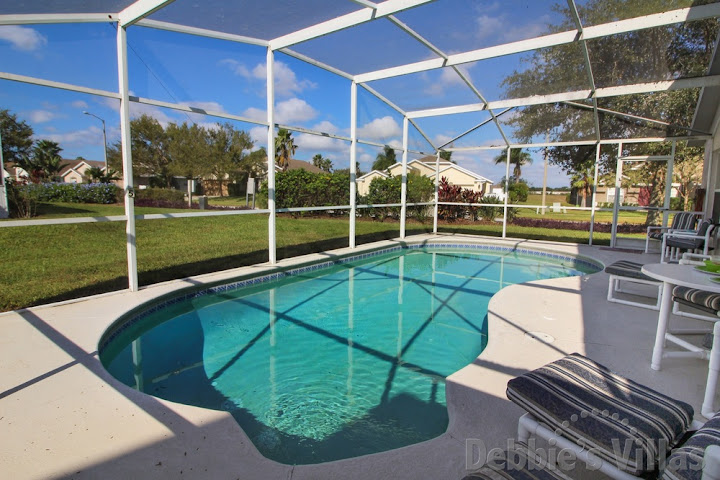 Private west-facing pool deck on Hampton Lakes in Davenport