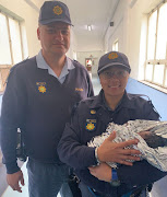 On his birthday W/O Werner Maree and Const Shaneez Daniels assisted a mother who had just given birth to a baby boy.