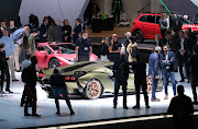 Visitors look at the new Lamborghini Sian during the press days at the 2019 Frankfurt Auto Show on September 11, 2019 in Frankfurt, Germany.