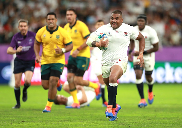 Kyle Sinckler of England runs clear to score his team's third try in their Rugby World Cup 2019 quarterfinal victory against Australia at Oita Stadium.