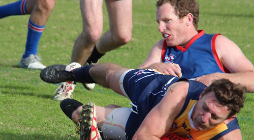 Narrabri Eagles skipper Todd Dunn scrambles with last year's Gillies Medal winner Andrew George for the ball this season. Todd claimed both the 'Coach of the Year' and 'Volunteer of the Year' at the TAFL presentation evening last weekend.