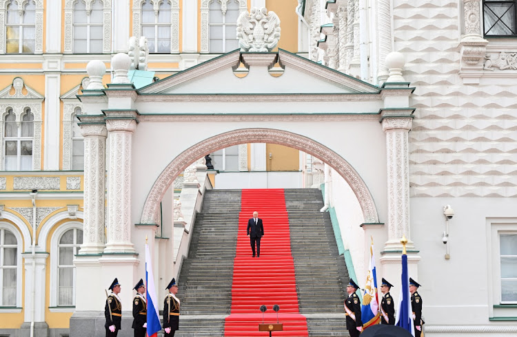 Russian President Vladimir Putin walks downstairs before addressing members of the Russian military in Cathedral Square at the Kremlin in Moscow, Russia, on June 27 2023. Picture: SPUTNIK/POOL via REUTERS