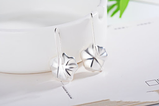 Title 1, Ladies Silver Pearl Lotus Earrings, a beautiful...