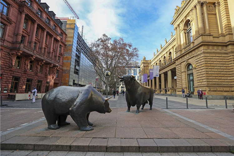 The bear and bull statues outside the Frankfurt Stock Exchange. Picture: BLOOMBERG/ALEX KRAUS