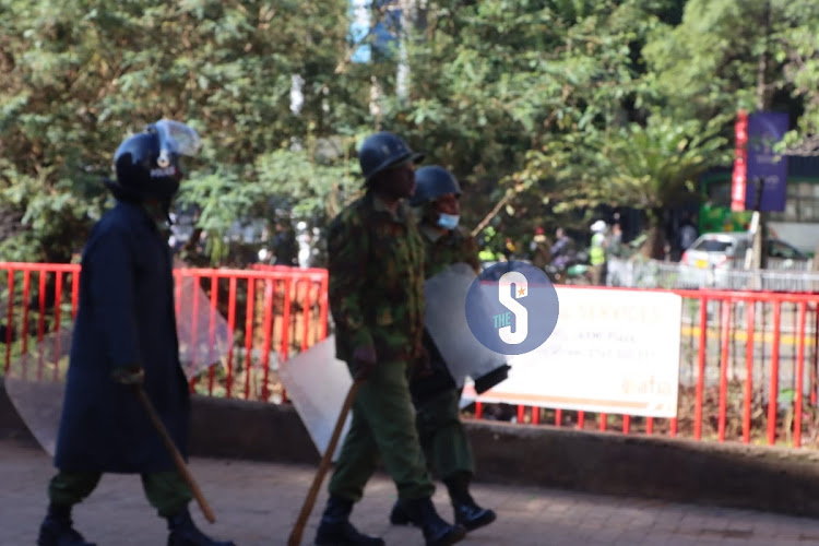 Anti-riot police office on standby along Moi Avenue Nairobi on March 27, 2023