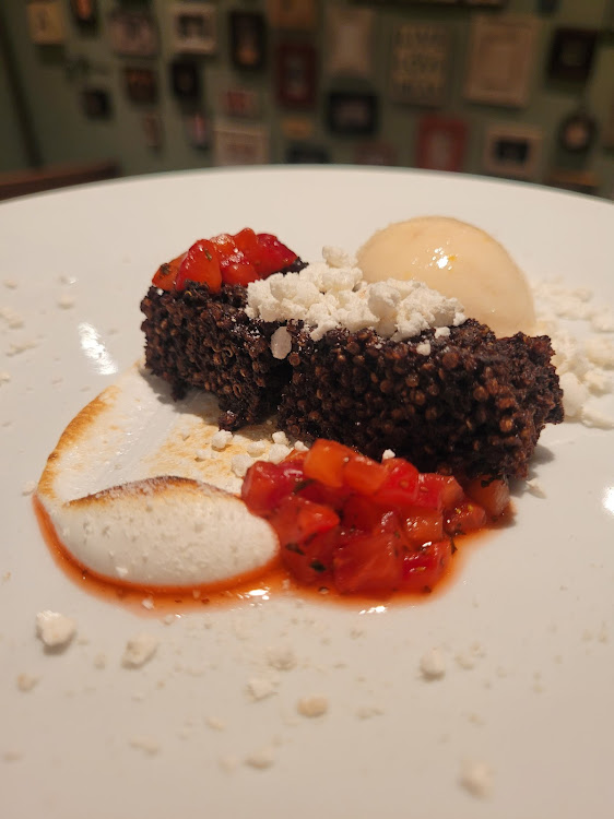 Chocolate quinoa cake, orange and berry frozen yoghurt, strawberry salsa, toasted meringue.