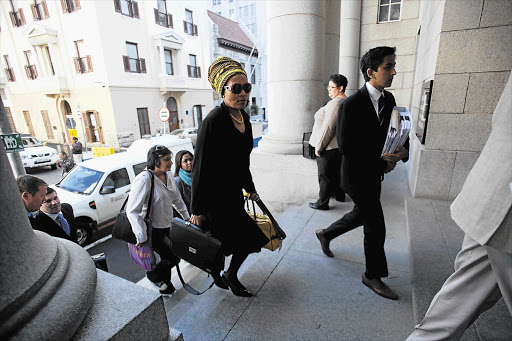 Thandi Maqubela arrives at the Cape Town High Court, where she and former pastor Vela Mabena are on trial for the murder of her husband, Acting Judge Patrick Maqubela, in 2009. File photo.