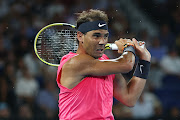 Rafael Nadal of Spain plays a backhand during his Men’s Singles Quarterfinal match against Dominic Thiem of Austria on day ten of the 2020 Australian Open at Melbourne Park on January 29, 2020 in Melbourne, Australia. 