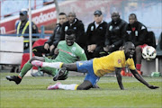 ROUGH PLAY: Mamelodi Sundowns' two-goal hero Cuthbert Malajila, right, is fouled by AmaZulu defender William Mwedihanga during their Absa Premiership match at Loftus  yesterday
      Photo: Lefty Shivambu/Gallo Images