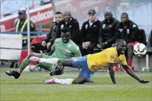 ROUGH PLAY: Mamelodi Sundowns' two-goal hero Cuthbert Malajila, right, is fouled by AmaZulu defender William Mwedihanga during their Absa Premiership match at Loftus yesterday Photo: Lefty Shivambu/Gallo Images