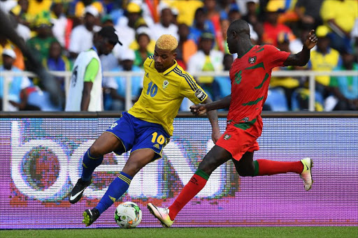 Gabon's midfielder Mario Lemina (L) challenges Guinea-Bissau's defender Agostinho Soares during the 2017 Africa Cup of Nations group A football match between Gabon and Guinea-Bissau at the Stade de l'Amitie Sino-Gabonaise in Libreville on January 14, 2017.