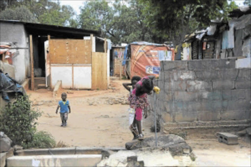 THE OTHER SIDE: The informal settlement in the middle of Innesfree Park in Sandton. PHOTO: VATHISWA RUSELO