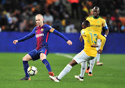 Andres Iniesta of Barcelona challenged by Khama Billiat of Mamelodi Sundowns during the 2018 Mandela Centenary Cup Friendly match between Mamelodi Sundowns and Barcelona at FNB Stadium, Johannesburg on May 16 2018. 