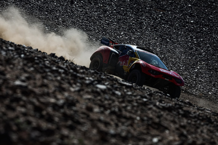 Nine-times world rally champion Loeb had two punctures on the left side of his Prodrive Hunter and wrestled with a broken hydraulic jack before finishing 16th on the 371km loop around Al'Ula that was won by Toyota's Frenchman Guerlain Chicherit.