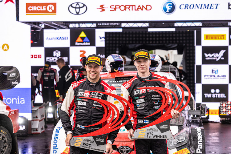 Kalle Rovanpera, right, and Jonne Halttunen celebrate winning the FIA World Rally Championship Estonia on July 17 2022 in Tallinn.