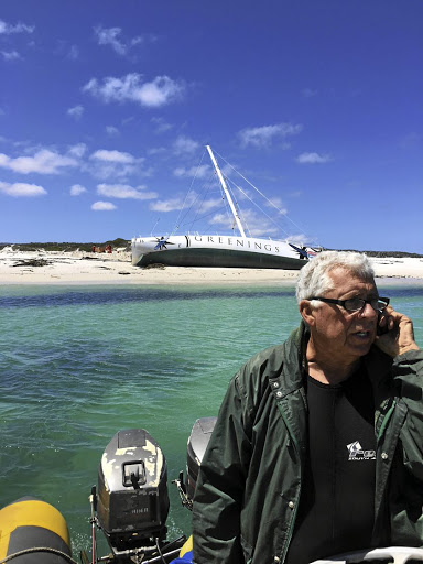 BELLY UP Salvage expert Gary Mills near the stranded Greenings yacht at Cape Point