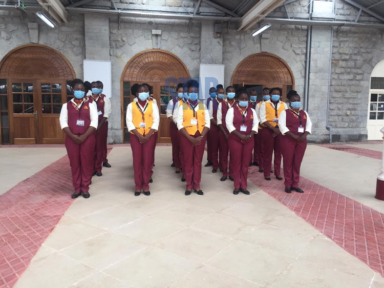 Ticket examiners at the Nairobi Central Railways Station.