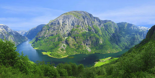 Summer months in Norway offer opportunities to boat on the famous fjords, like Naeroyfjord, northeast of Bergen.