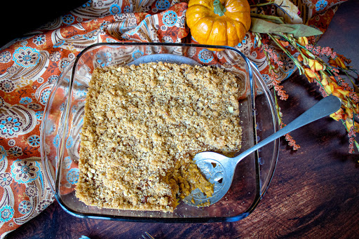 Scooping the Crunch Topped Pumpkin Casserole.