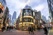 Nishi Shinjuku, Tokyo, boasts shops, parks and restaurants. Mode Gakuen Cocoon Tower is in the background,