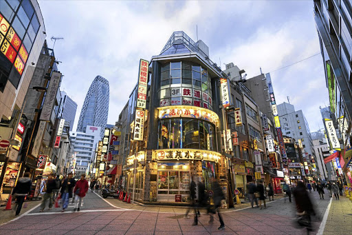 Nishi Shinjuku, Tokyo, boasts shops, parks and restaurants. Mode Gakuen Cocoon Tower is in the background,