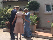 Prince Harry, Meghan Markle and Graca Machel.