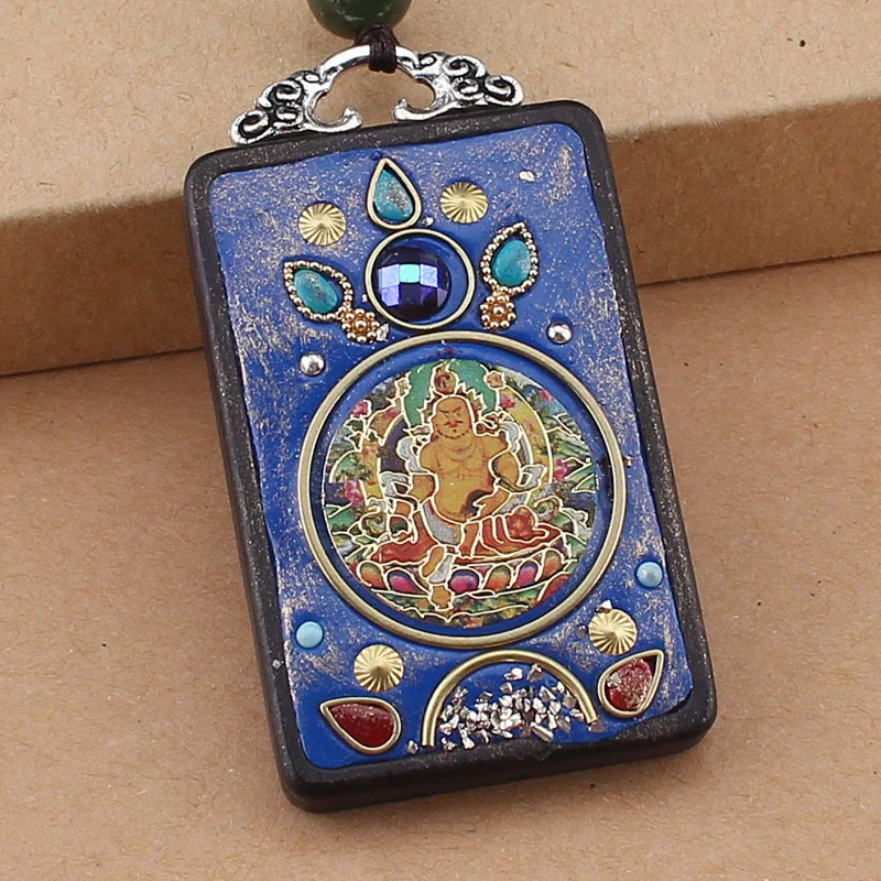 Pendentif Thangka Ethnique en Ébène Fait à la Main. Portez l'art spirituel bouddhiste. Un bijou unique pour la méditation et l'éveil.