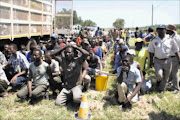 CRAMMED: An overloaded truck in Mpumalanga drove into the hands of Police Commissioner Bheki Cele (inset) and Police Minister Nathi Mthethwa. Pic: ANDREW HLONGWANE 19/12/2009. © Sowetan.