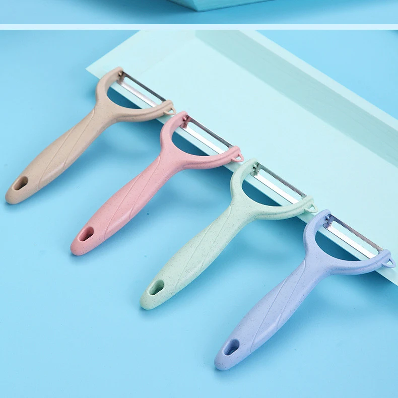 Stainless steel domestic fruit peeler, effortlessly peels and slices fruits, sharp blade, ergonomic design, easy to clea
