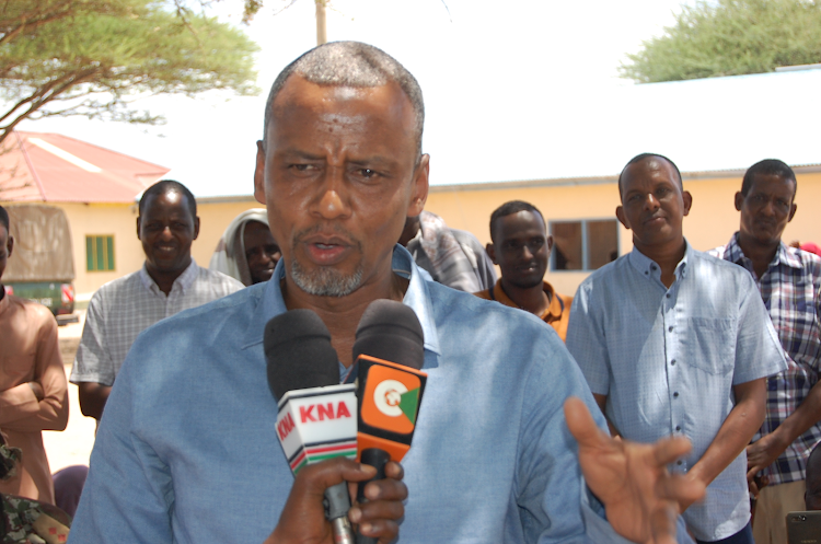 Fafi MP Abdikarim Osman speaking on Sunday after donataing motorcycles to youths in Bura town.