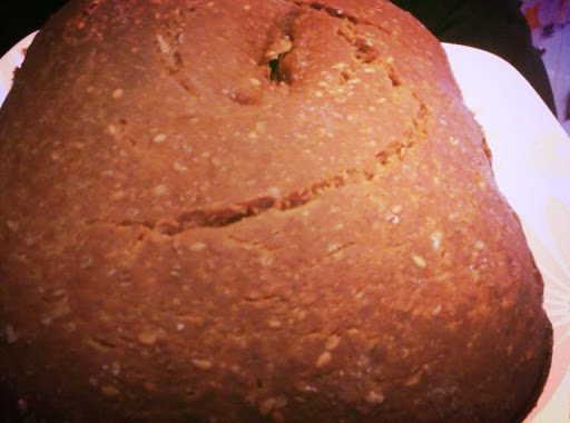 This tasty bread has healthy oils, wheat flour, and came out with a pretty swirl baked atop it. Yum!