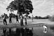 RAINY SEASON: Kaama village, where many people from the low-lying areas in Zambia move during the seasonal flooding of the Zambezi River in Zambia's Western Province. PIC: JAMES OATWAY. 29/04/2009. © Sunday Times.