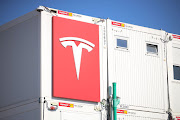 The Tesla logo is seen during last week's official opening of the new Tesla electric car manufacturing plant near Gruenheide, Germany.