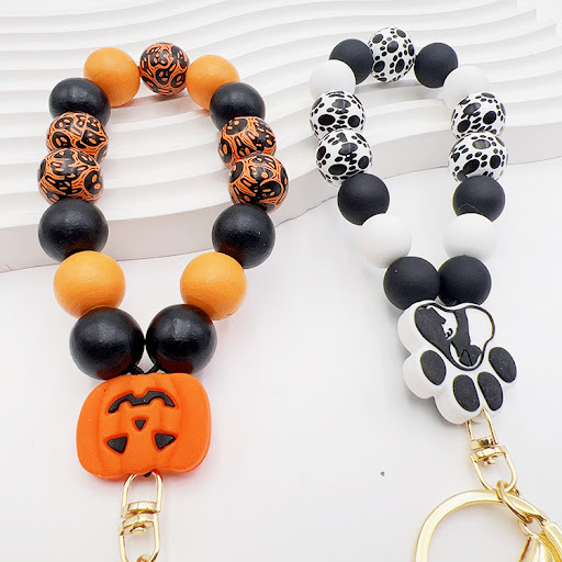 Title 7, Silicone Wooden Beads Bracelet Keychain, a safe...