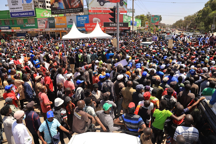 A mammoth crowd throng streets of Machakos Town as Azimio la Umoja campaign team led by Raila Odinga arrives for a rally at Old Naivas roundabout on Saturday, March 5, 2022.