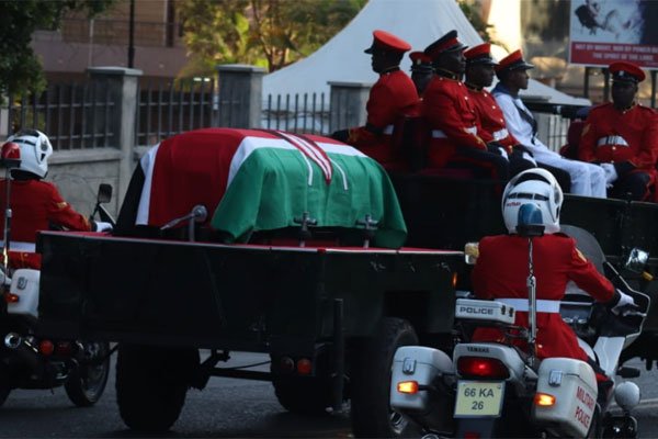 Casket carrying Moi's body leaves Lee funeral home under heavy military security.