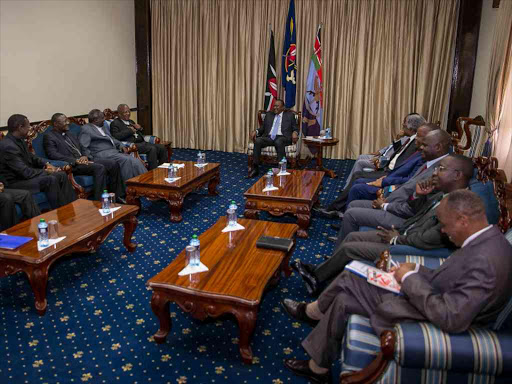 President Uhuru Kenyatta meets Catholic bishops at State House, Nairobi. The bishops were led by John Cardinal Njue and Rt Rev Phillip Anyoli, chairman of the Kenya Conference of Catholic bishops /PSCU