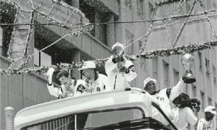 Orlando Pirates' Brandon Silent and Jerry Sikhosana join officials in their parade of the 1995 African Champions Cup through Johannesburg. Bucs aim to scale those heights again soon.