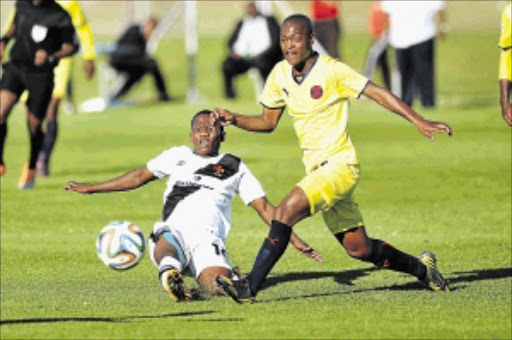 DOWN BUT NOT OUT: Stanley Muishond of Vasco da Gama and Thato Sithole of Jomo Cosmos during their National First Division drawn match at Parow Park on Saturday Photo: Ashley Vlotman/Gallo Images