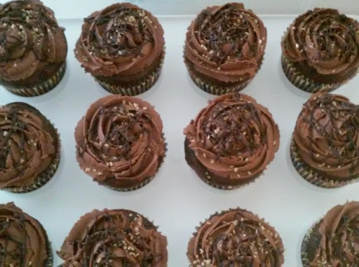 Chocolate cupcakes, custard filled with homemade chocolate frosting. I added gold cake sprinkles and finished it with a drizzle of melted chocolate 