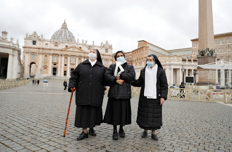 Nuns walk at St. Peter's Square on Christmas Day amidst the coronavirus disease lockdown, at the Vatican, on Christmas day. The Chinese government is clamping down on churches and arrested nuns.