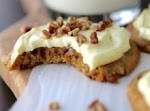 Carrot Cake Pecan Cookies with Orange Cream Cheese Frosting was pinched from <a href="http://www.laurenslatest.com/carrot-cake-pecan-cookies-with-orange-cream-cheese-frosting/" target="_blank">www.laurenslatest.com.</a>